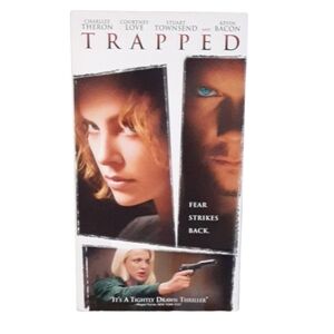 6/$15 Trapped is a 2002 crime thriller vhr tape